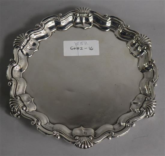 An Edwardian silver waiter, with shell border, Goldsmiths & Silversmiths, London, 1909, 11.5 oz.